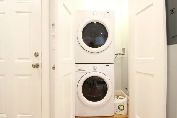 a utility room with dryer and washer