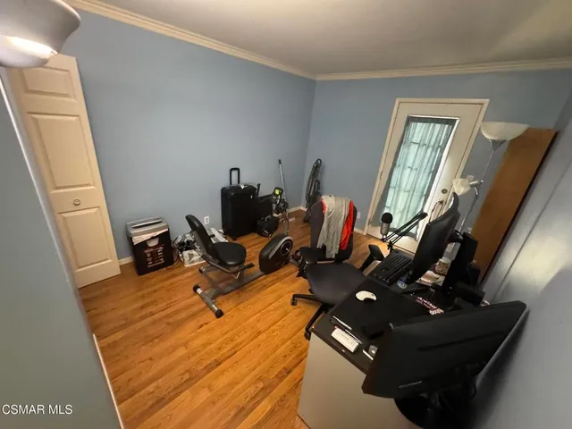 a large room with wooden floor