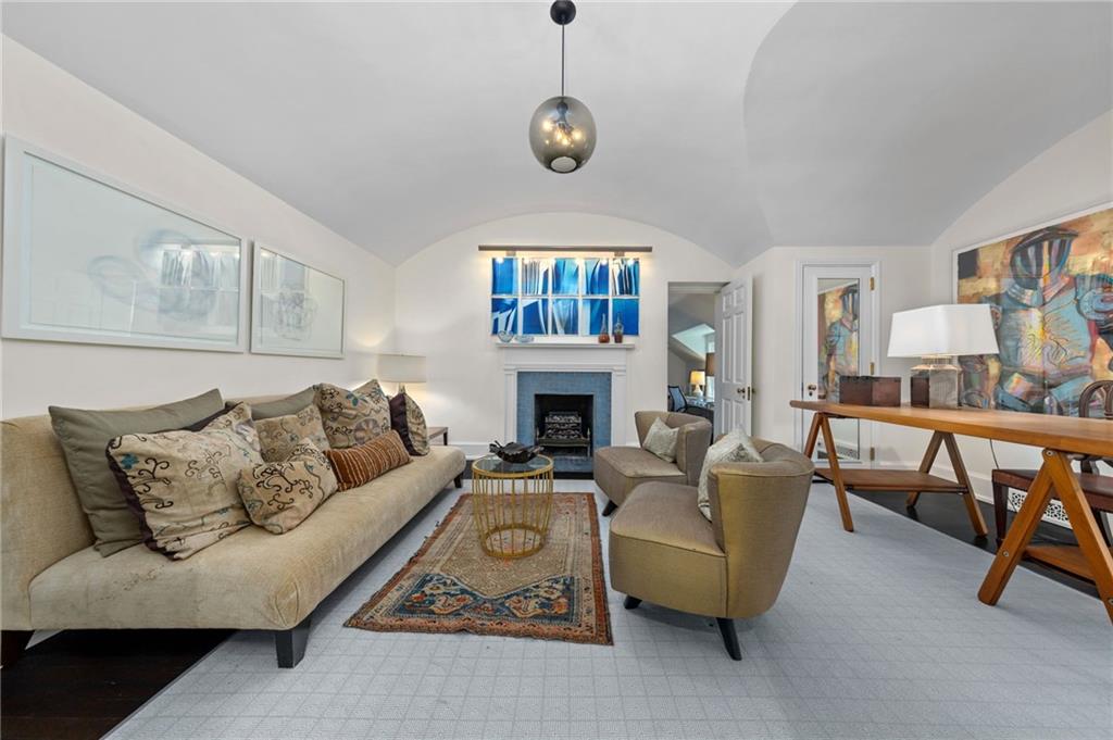257 Scaife Road Sewickley, PA 15143 - Photo 27 of 50 a living room with furniture a fireplace and a table