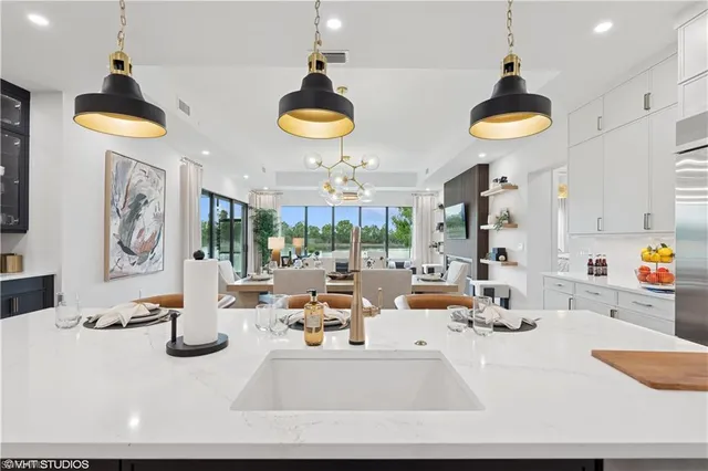 a kitchen with a table and chairs