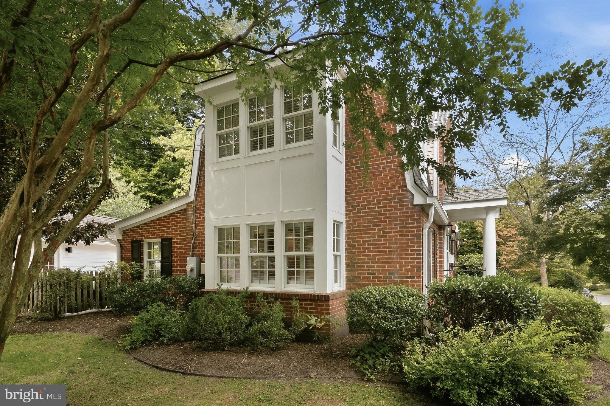6100 Gloster Road Bethesda, MD 20816 - Photo 2 of 67 2-story box bay addition on the side of the home.