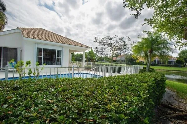 a house view with a garden space