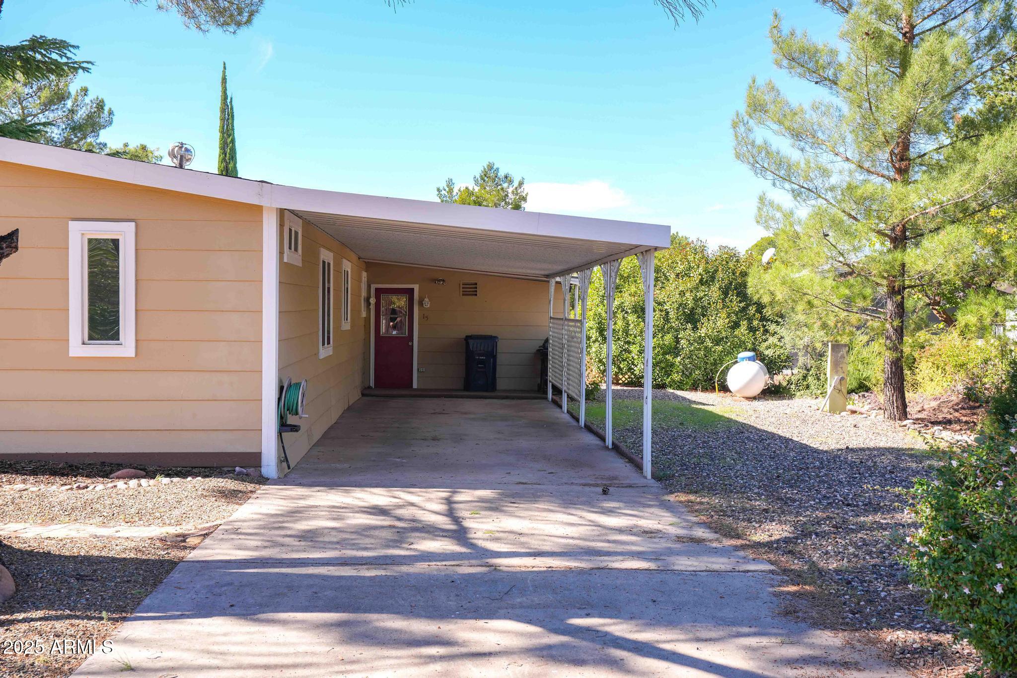 6770 West State Rte 89A, Unit 15 Sedona, AZ 86336 - Photo 25 of 27 a view of a entryway door front of house