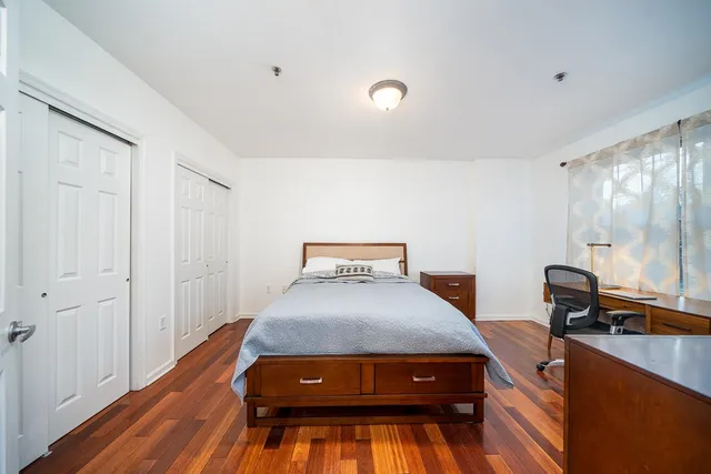 a room with a bed and a table