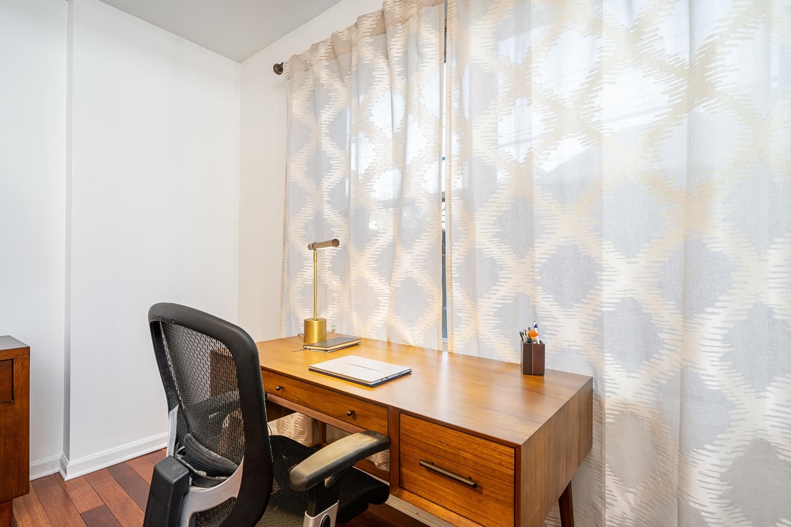 650 2nd Street, Unit 2K Hoboken, NJ 07030 - Photo 16 of 23 a view of a workspace with furniture and a bathroom