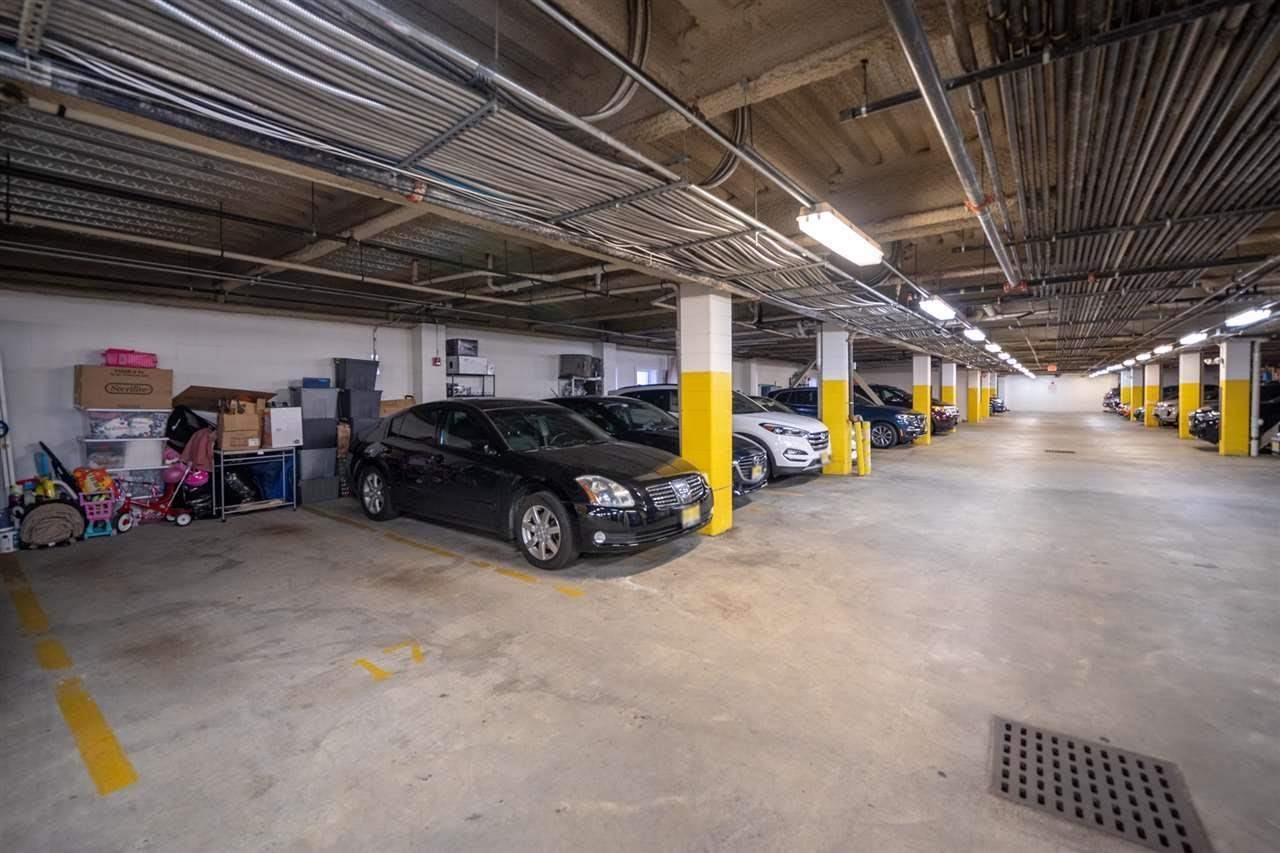 650 2nd Street, Unit 2K Hoboken, NJ 07030 - Photo 20 of 23 a view of a garage with parked cars