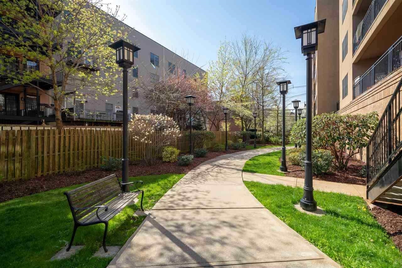 650 2nd Street, Unit 2K Hoboken, NJ 07030 - Photo 22 of 23 a view of a chair and table in backyard of the house