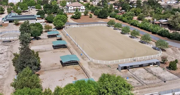 an aerial view of a swimming pool and outdoor space