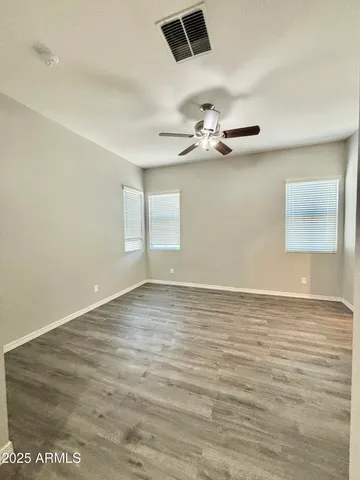 a bathroom with a glass door shower
