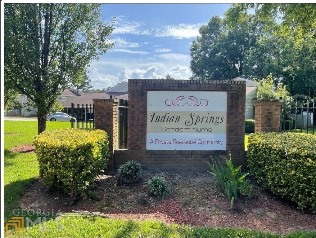 2037 Oak Park Lane Decatur, GA 30032 - Photo 1 of 1 a sign on the side of the road