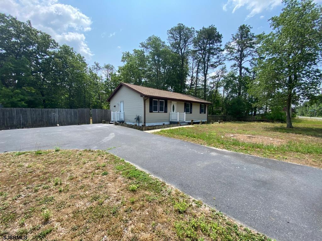 1564 Old Egg Harbor Road Mays Landing, NJ 08330 - Photo 1 of 11 a view of a house with a swimming pool