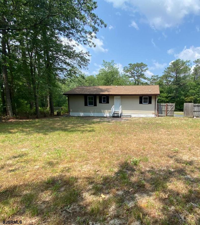 1564 Old Egg Harbor Road Mays Landing, NJ 08330 - Photo 10 of 11 a front view of a house with garden