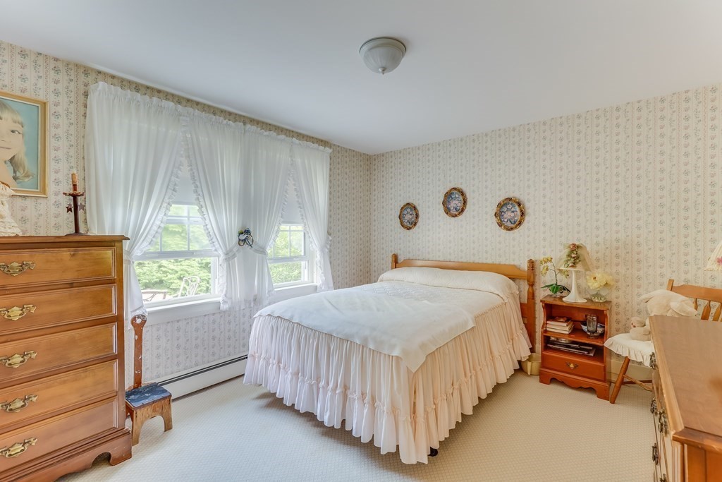 208 Osterville West Barnstable Road Barnstable, MA 02655 - Photo 15 of 27 a bedroom with a bed and a window