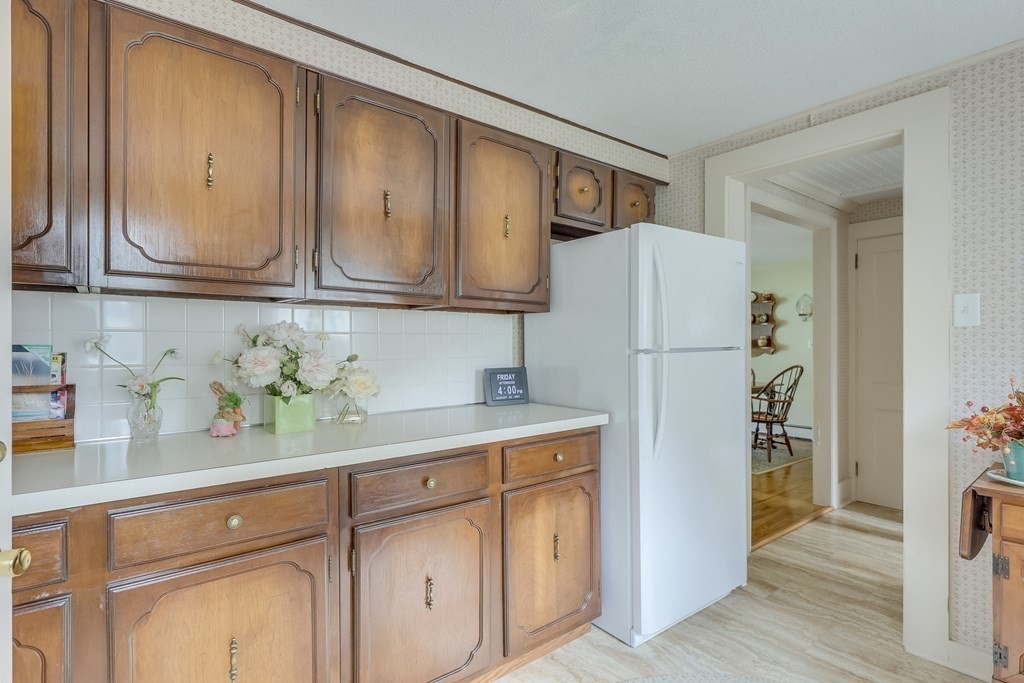 208 Osterville West Barnstable Road Barnstable, MA 02655 - Photo 16 of 27 a kitchen with stainless steel appliances a refrigerator and a sink
