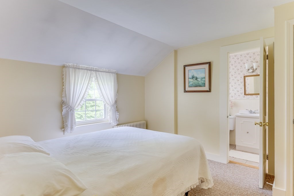 208 Osterville West Barnstable Road Barnstable, MA 02655 - Photo 20 of 27 a bedroom with a bed and a window