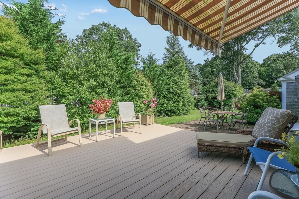 208 Osterville West Barnstable Road Barnstable, MA 02655 - Photo 3 of 27 a garden view with a seating space