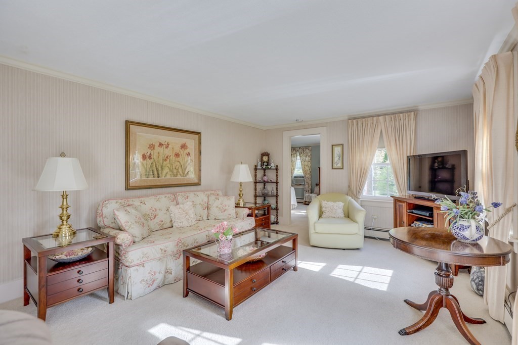 208 Osterville West Barnstable Road Barnstable, MA 02655 - Photo 5 of 27 a living room with furniture and a flat screen tv