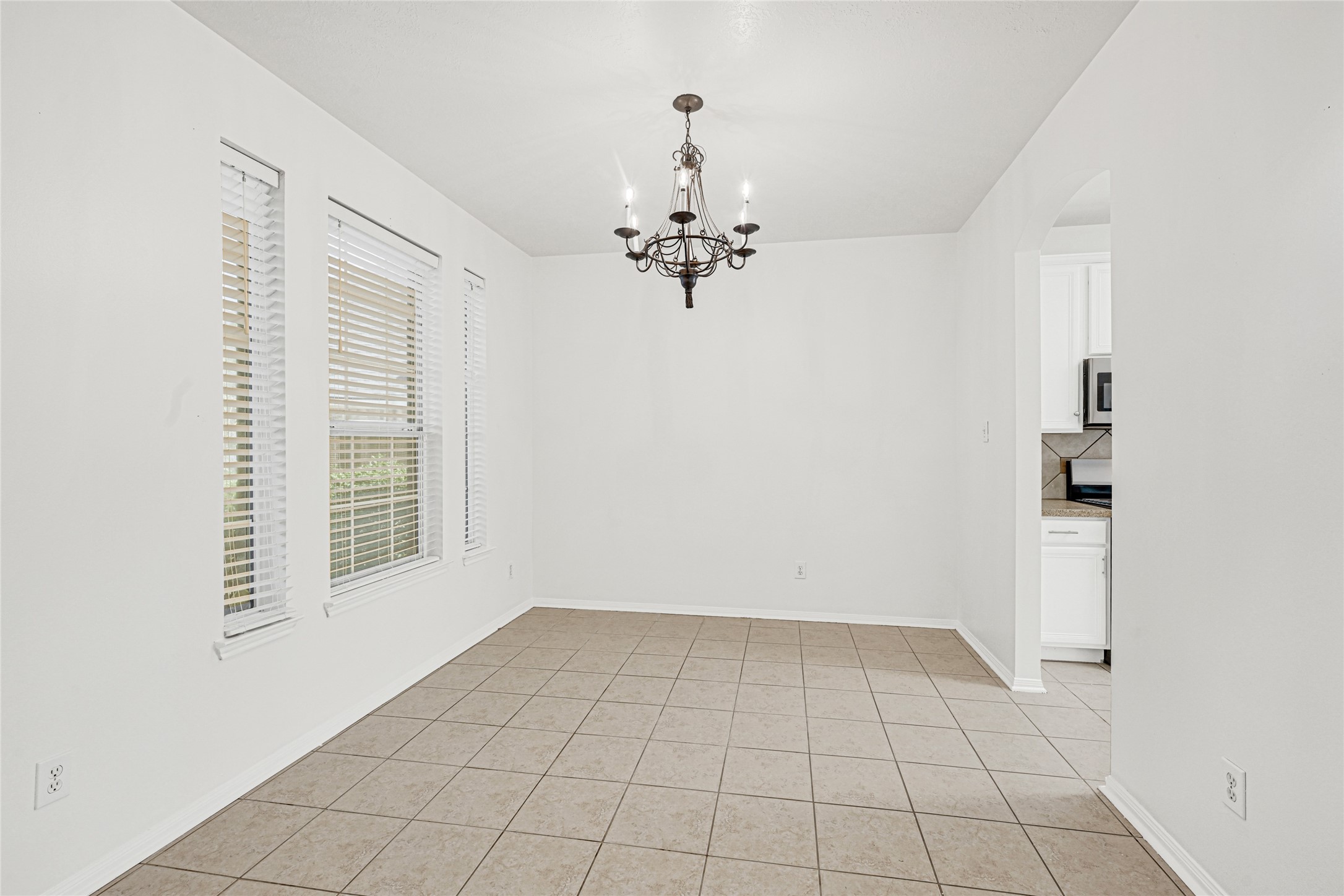 4807 Elm View Circle Houston, TX 77084 - Photo 5 of 27 a view of an empty room with a window