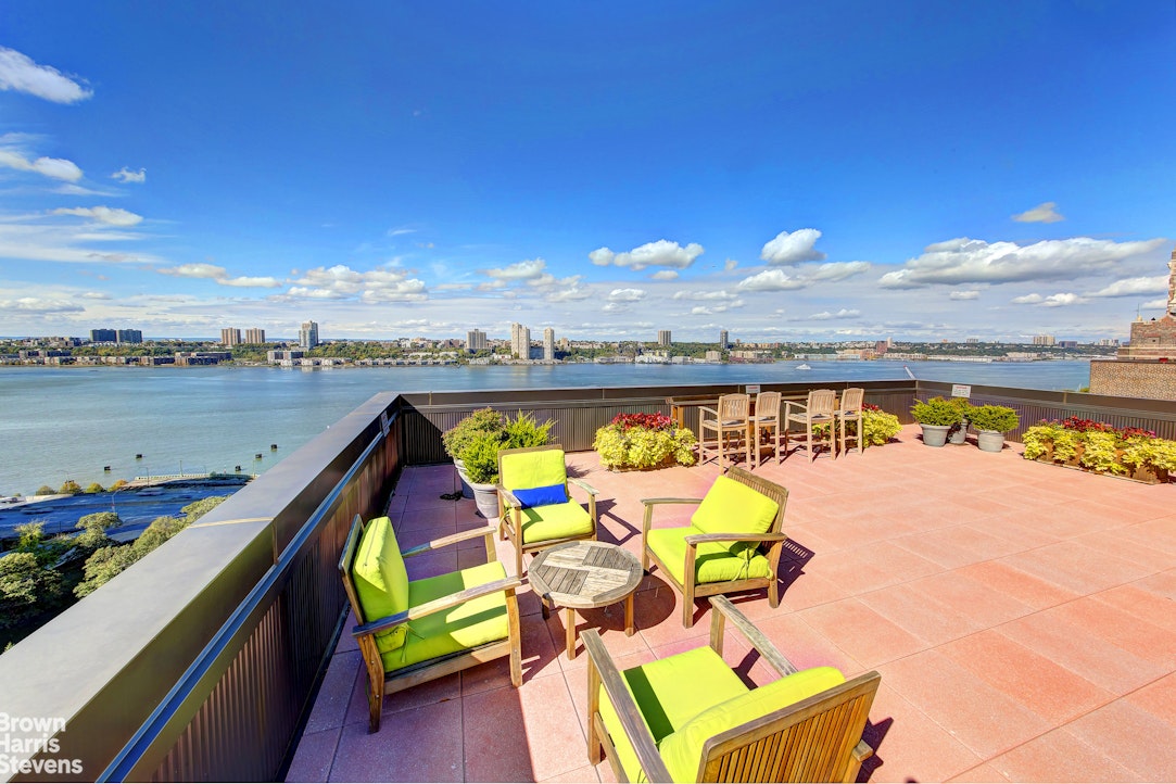 11 Riverside Drive, Unit 1DW Manhattan, NY 10023 - Photo 10 of 15 a view of swimming pool with seating space