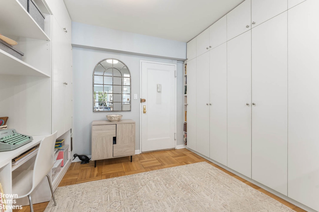11 Riverside Drive, Unit 1DW Manhattan, NY 10023 - Photo 6 of 15 a view of a livingroom with wooden floor and window