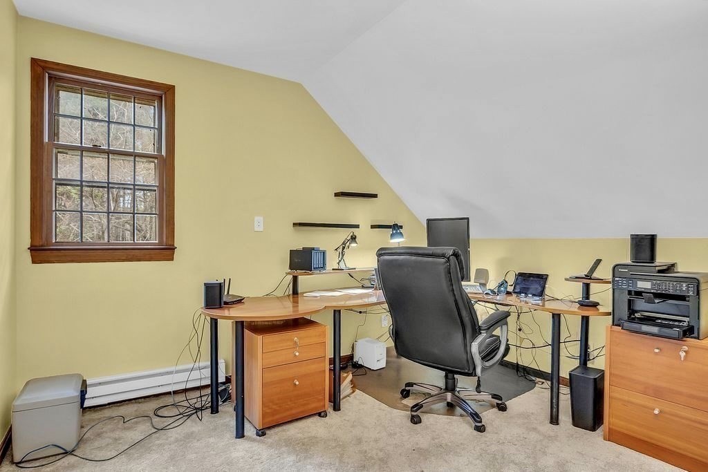 40 Bulkeley Road Littleton, MA 01460 - Photo 14 of 35 a view of a workspace with furniture and a window