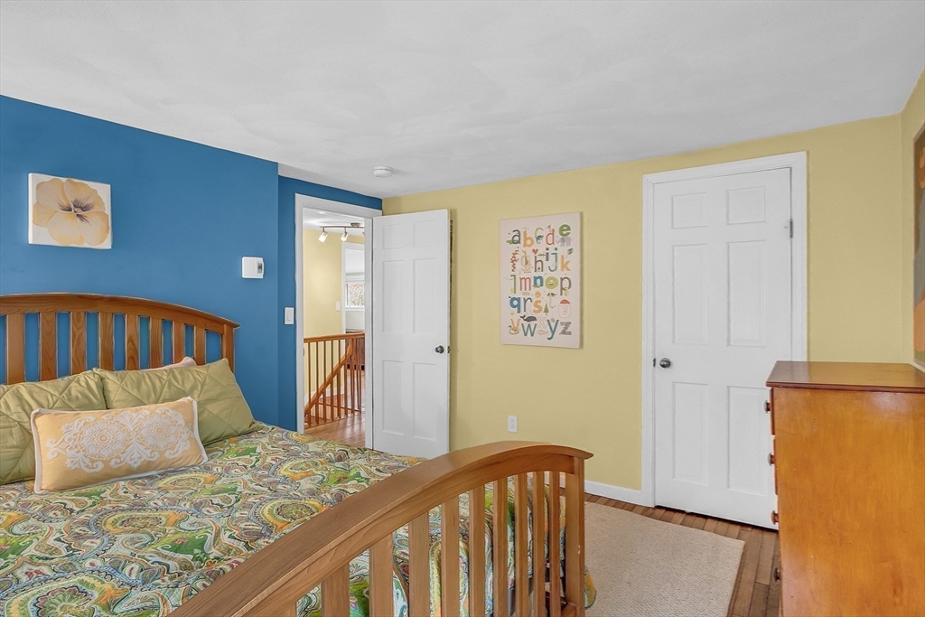 40 Bulkeley Road Littleton, MA 01460 - Photo 19 of 35 a bedroom with a bed and a dresser