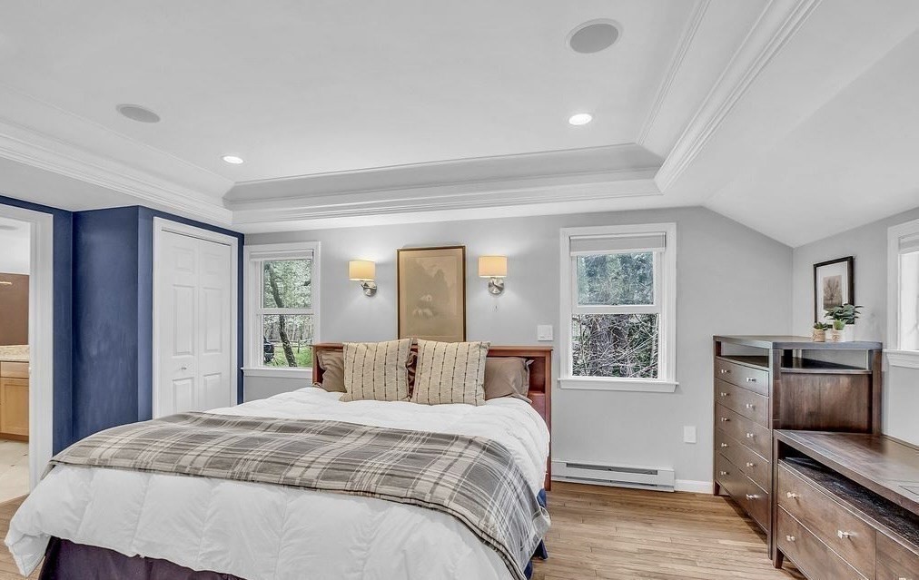 40 Bulkeley Road Littleton, MA 01460 - Photo 23 of 35 a bedroom with a large bed and a tv