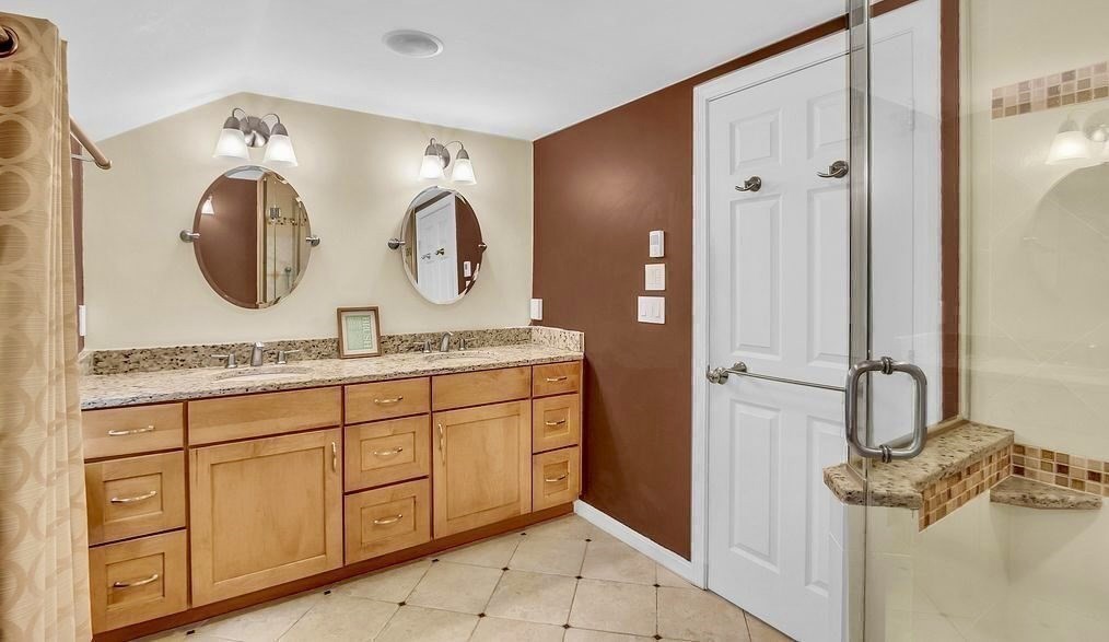 40 Bulkeley Road Littleton, MA 01460 - Photo 25 of 35 a bathroom with a sink and a mirror