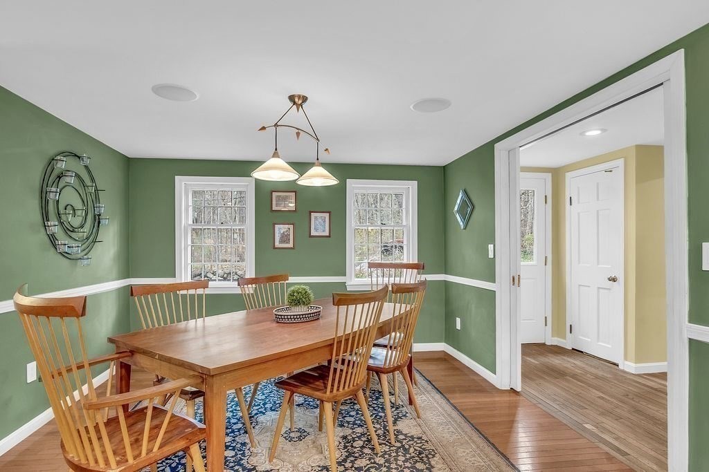 40 Bulkeley Road Littleton, MA 01460 - Photo 5 of 35 a view of a dining room with furniture window and wooden floor