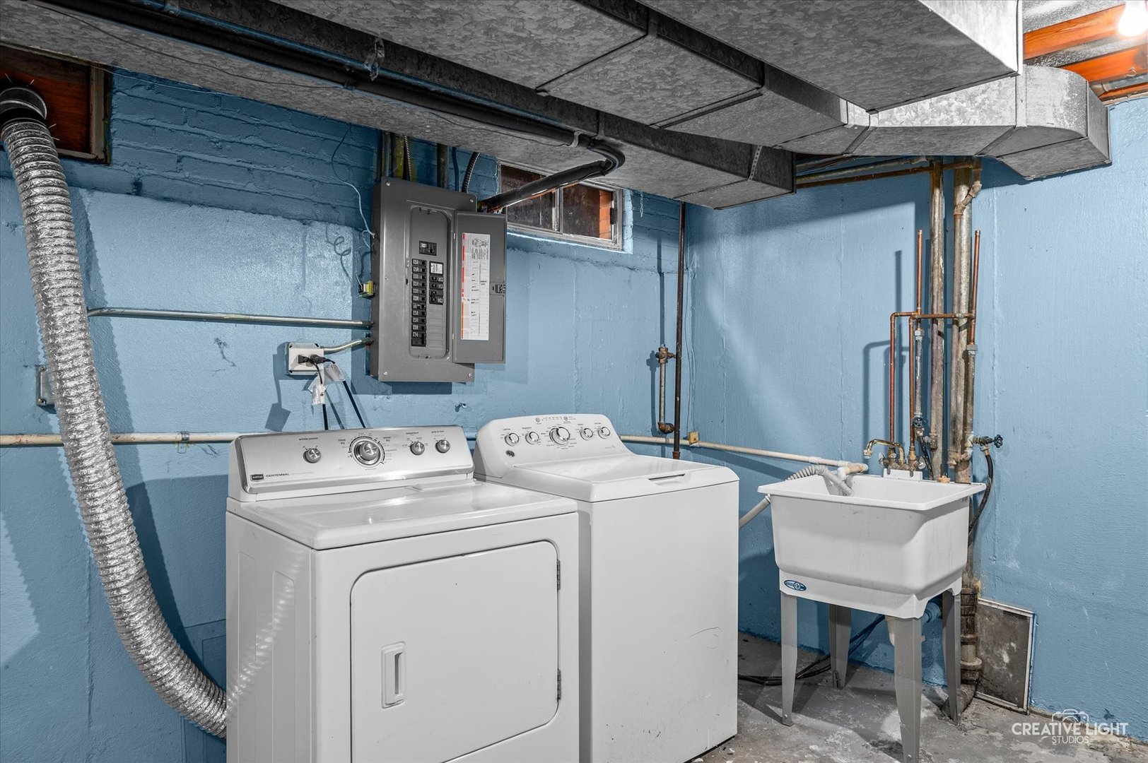 8802 Prospect Street Niles, IL 60714 - Photo 16 of 20 a utility room with dryer and washer
