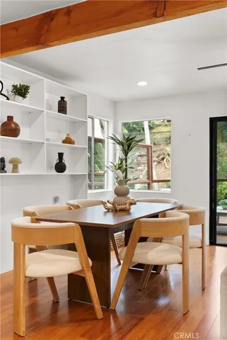 a room with furniture and wooden floor