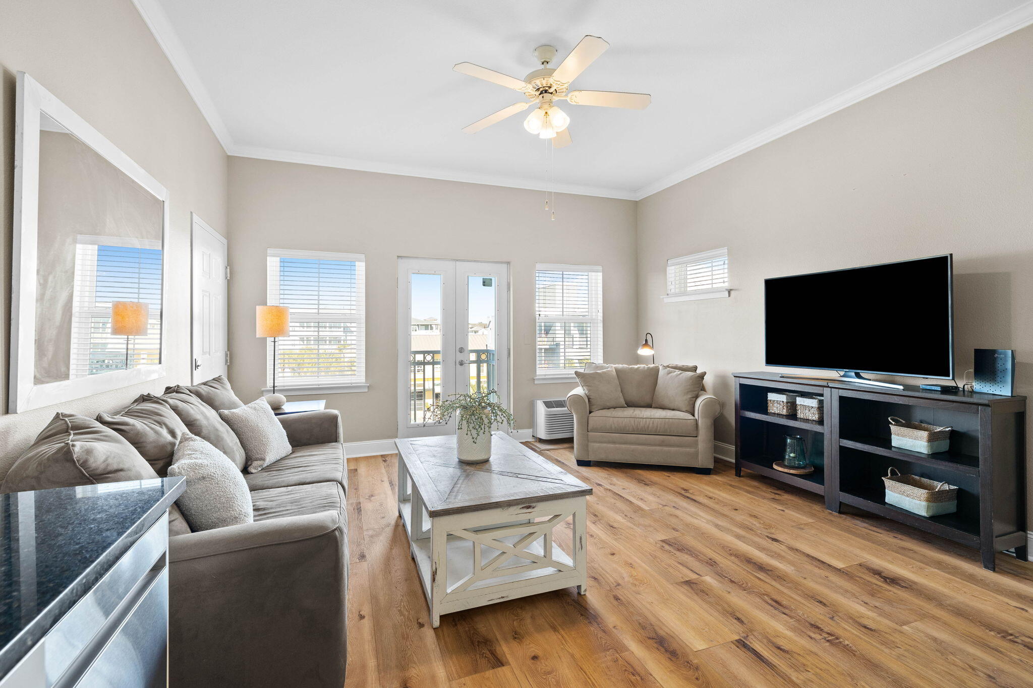 45 Town Center Loop, Unit 416 Santa Rosa Beach, FL 32459 - Photo 11 of 32 a living room with furniture and a flat screen tv