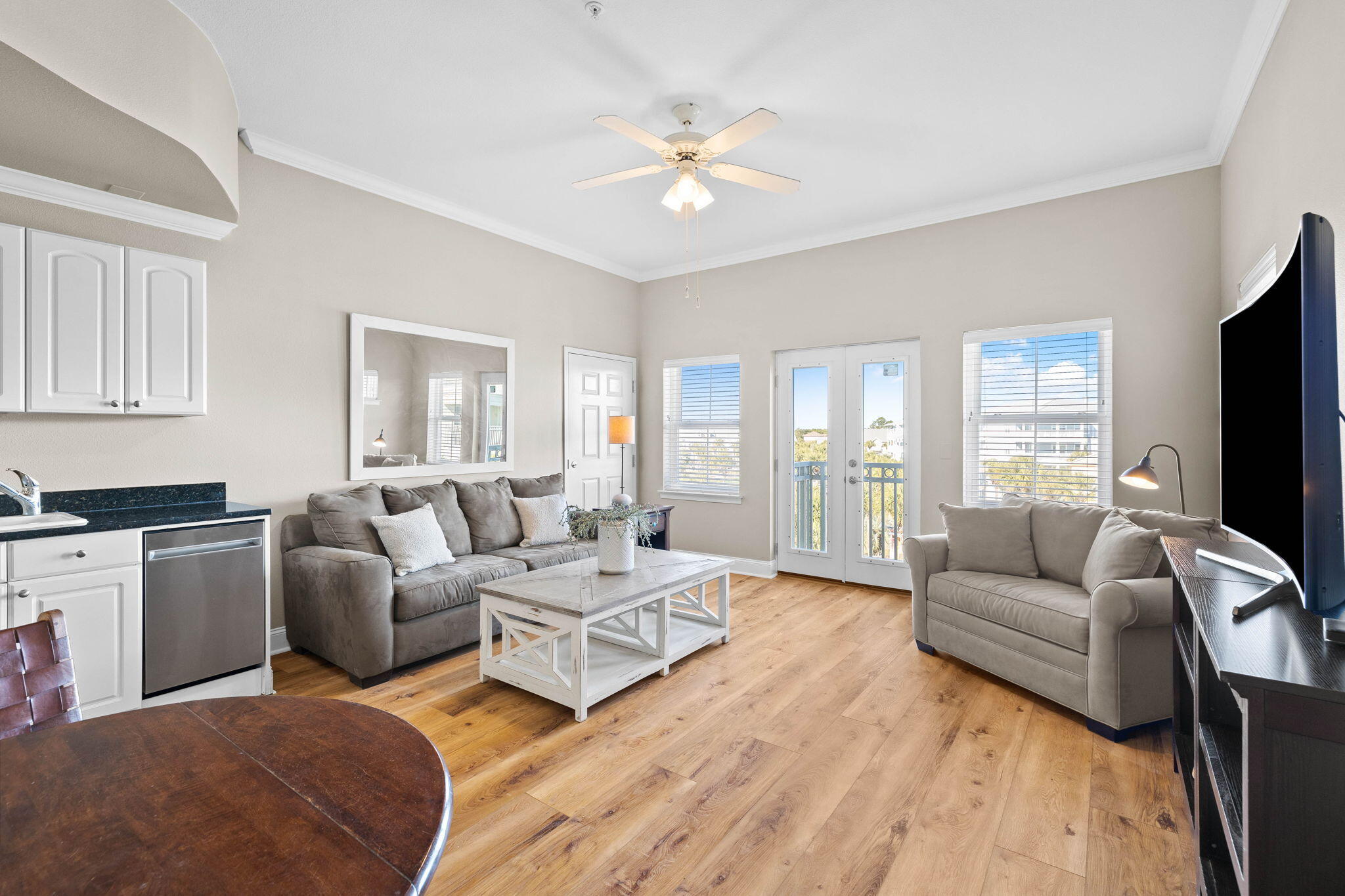 45 Town Center Loop, Unit 416 Santa Rosa Beach, FL 32459 - Photo 12 of 32 a living room with furniture and a flat screen tv