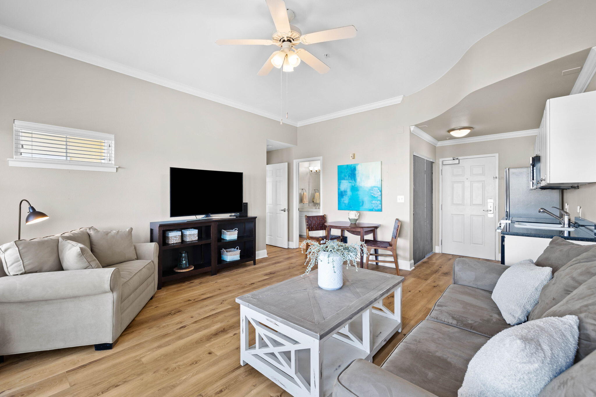 45 Town Center Loop, Unit 416 Santa Rosa Beach, FL 32459 - Photo 13 of 32 a living room with furniture and a flat screen tv