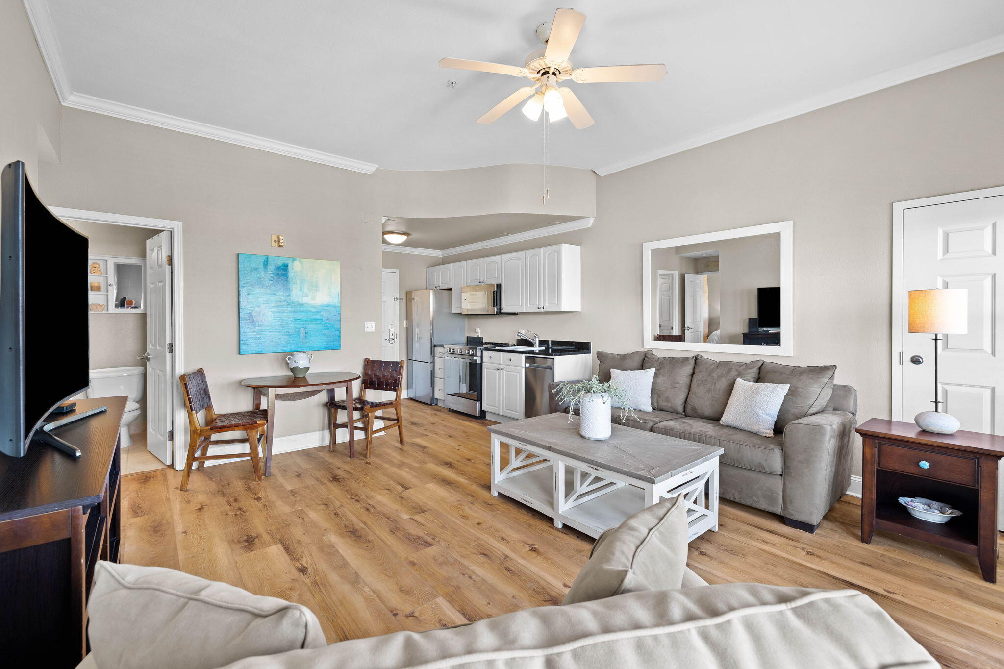 45 Town Center Loop, Unit 416 Santa Rosa Beach, FL 32459 - Photo 14 of 32 a living room with furniture and a flat screen tv