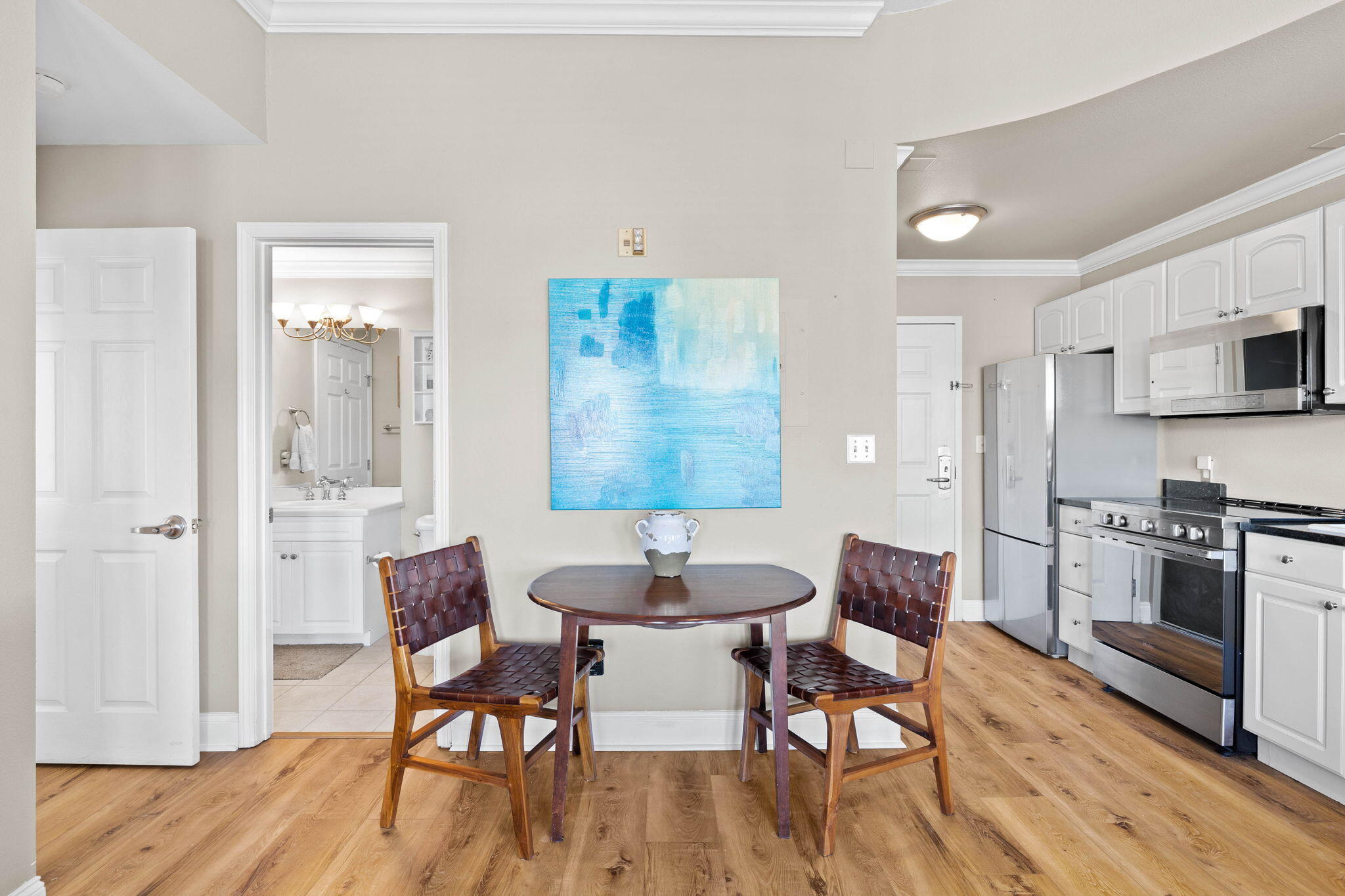 45 Town Center Loop, Unit 416 Santa Rosa Beach, FL 32459 - Photo 15 of 32 a dining room with furniture and wooden floor