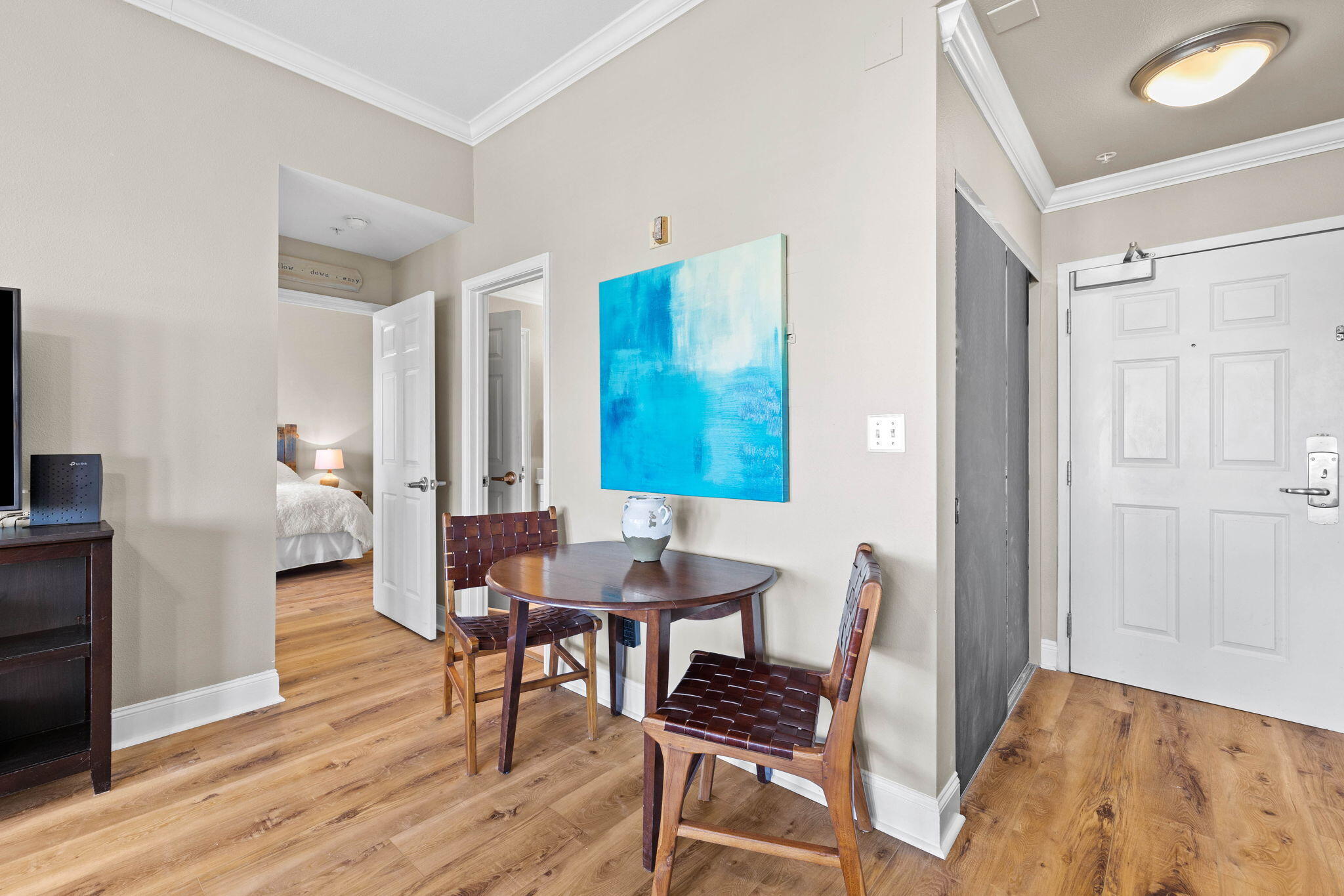 45 Town Center Loop, Unit 416 Santa Rosa Beach, FL 32459 - Photo 17 of 32 a view of a livingroom with furniture and wooden floor