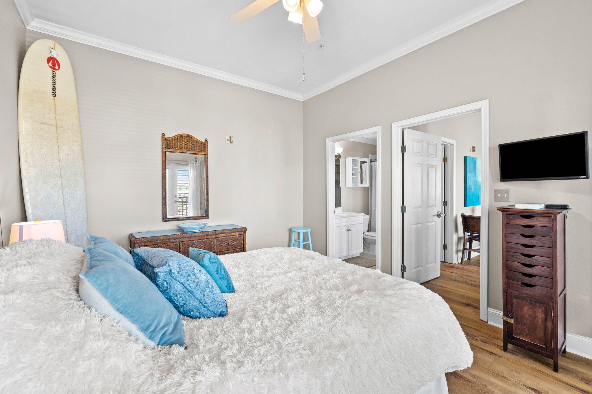 45 Town Center Loop, Unit 416 Santa Rosa Beach, FL 32459 - Photo 20 of 32 a bedroom with a bed and a flat screen tv