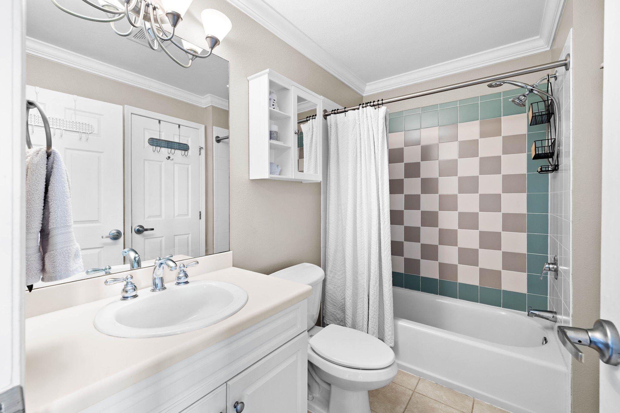 45 Town Center Loop, Unit 416 Santa Rosa Beach, FL 32459 - Photo 21 of 32 a bathroom with a sink a toilet and shower