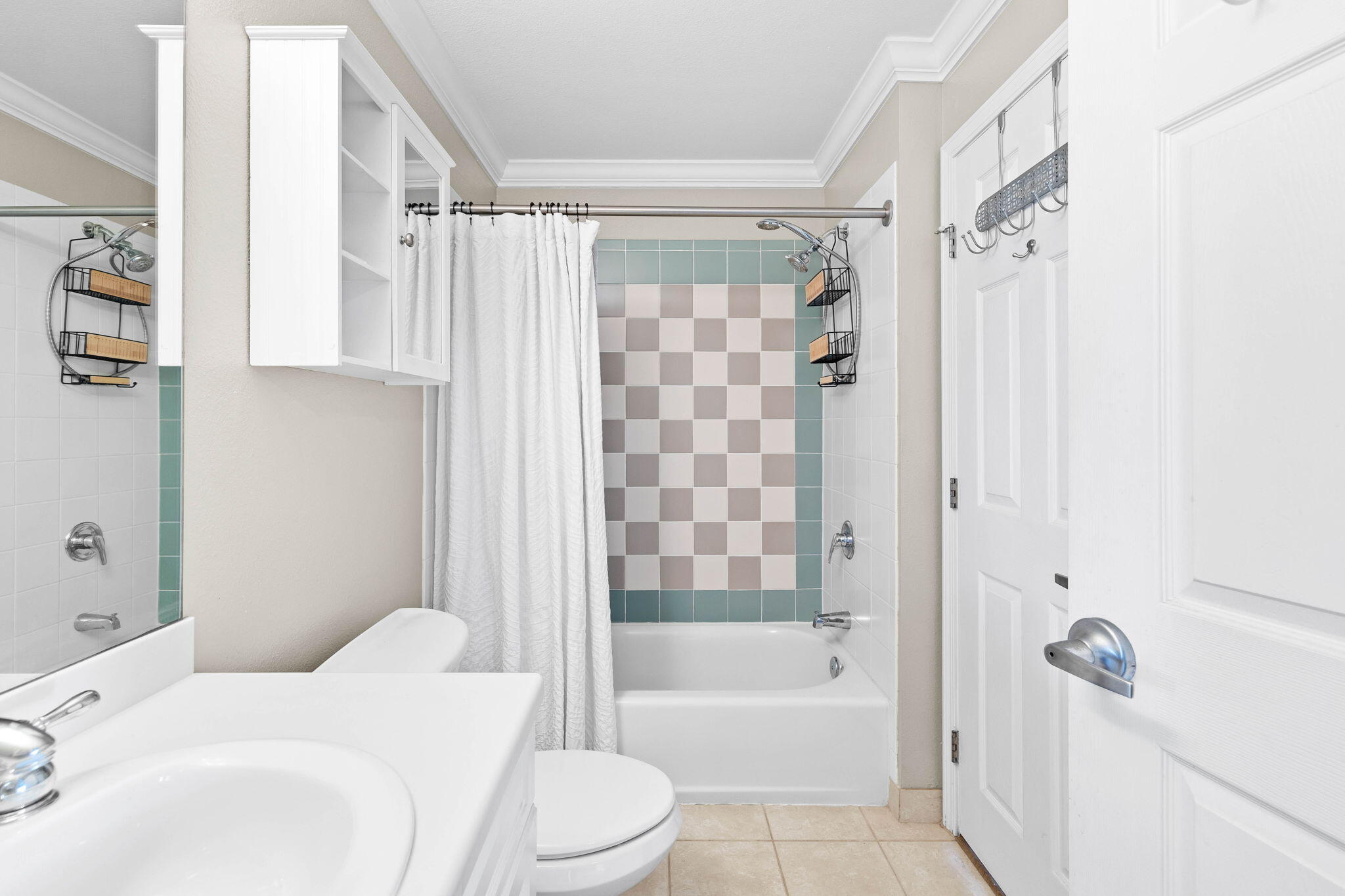 45 Town Center Loop, Unit 416 Santa Rosa Beach, FL 32459 - Photo 22 of 32 a bathroom with a bathtub shower sink vanity and toilet