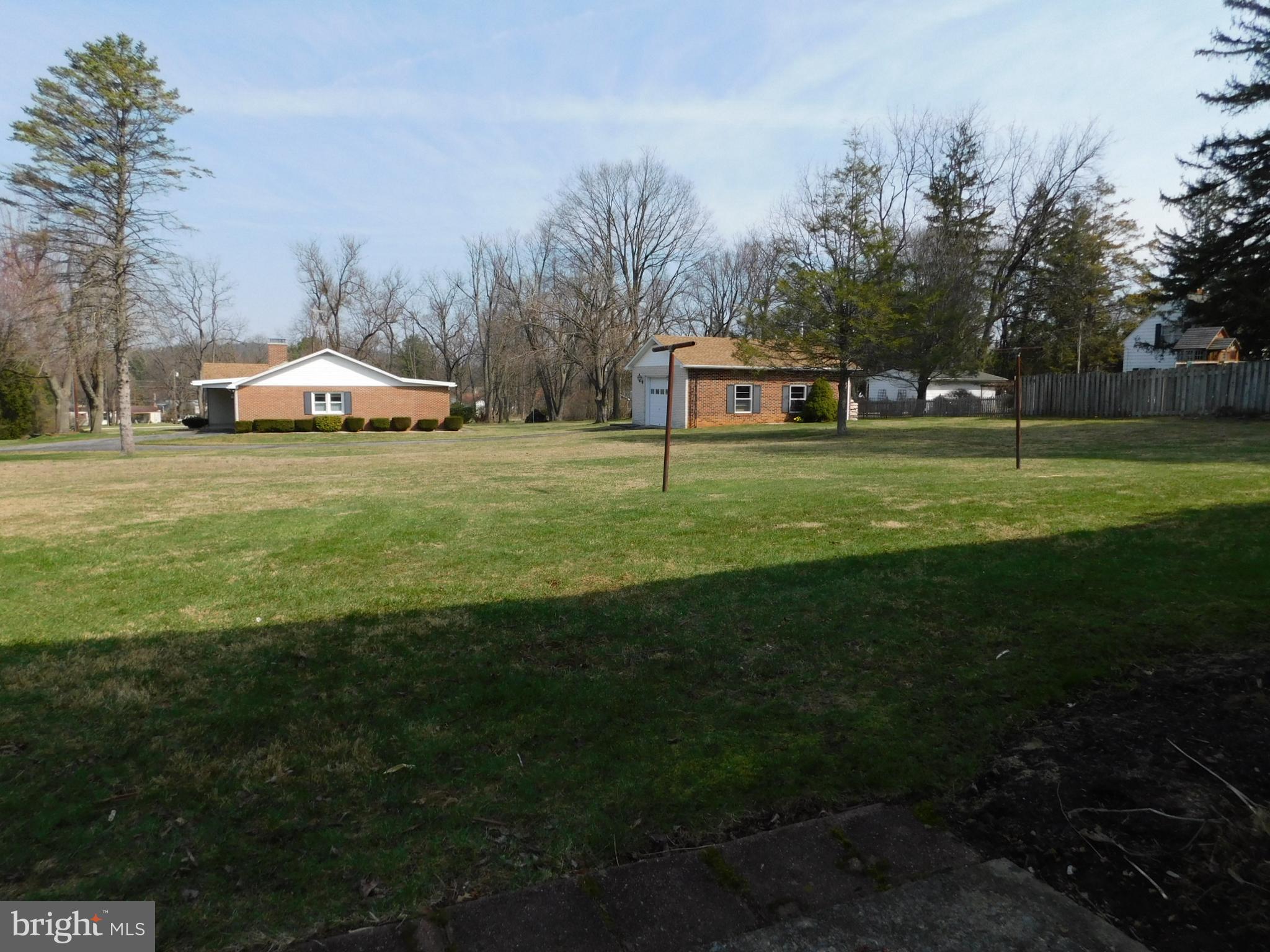 15253 Ressler Lane Blue Ridge Summit, PA 17214 - Photo 18 of 21 a front view of a house with a yard and trees