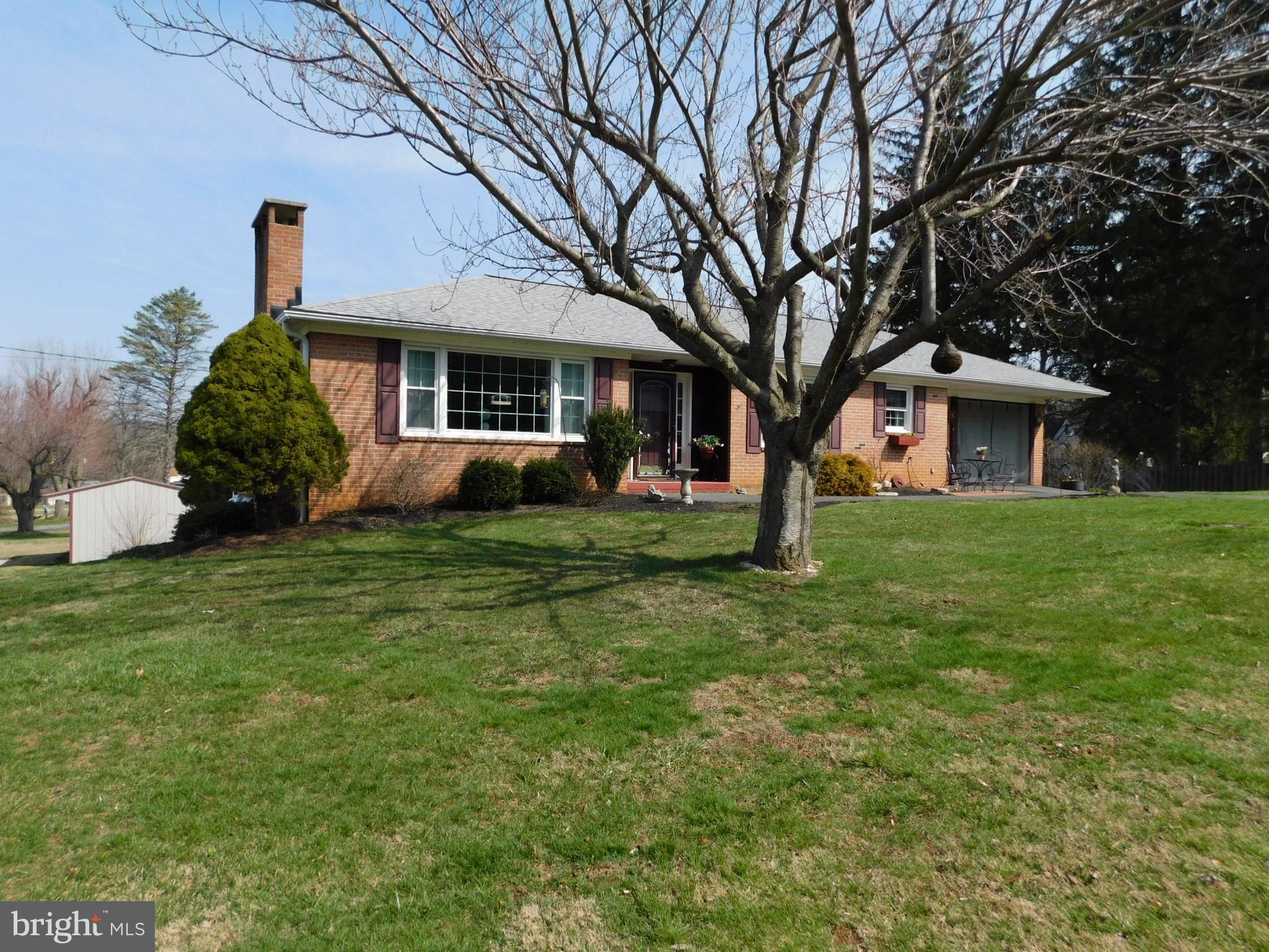 15253 Ressler Lane Blue Ridge Summit, PA 17214 - Photo 2 of 21 a front view of house with yard and green space