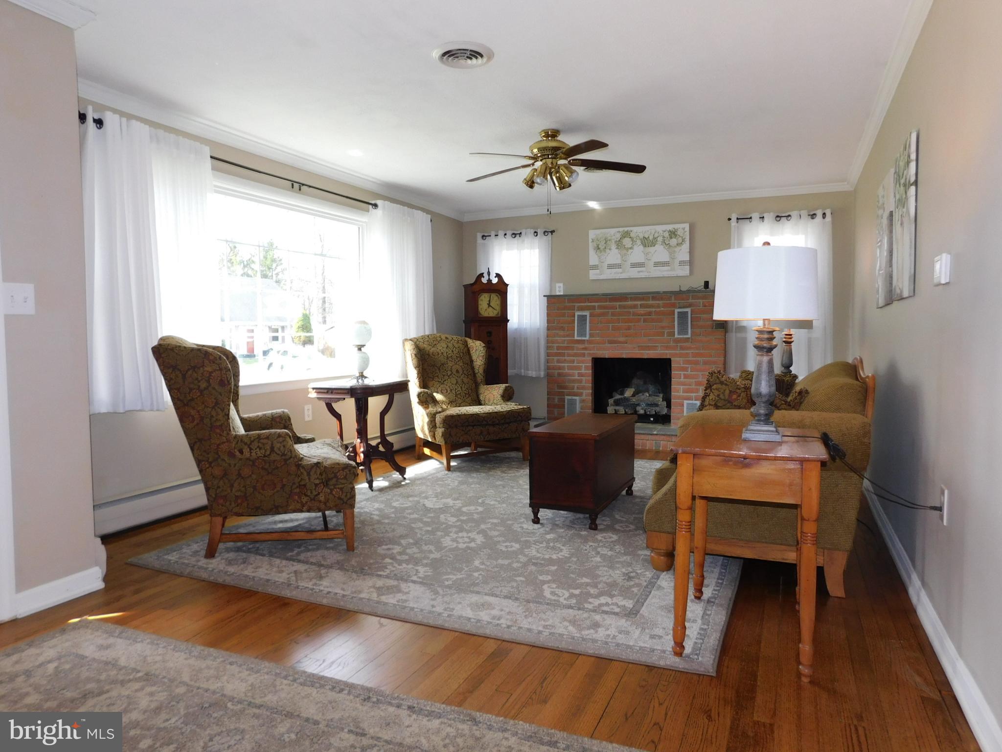 15253 Ressler Lane Blue Ridge Summit, PA 17214 - Photo 5 of 21 a living room with furniture fireplace and window