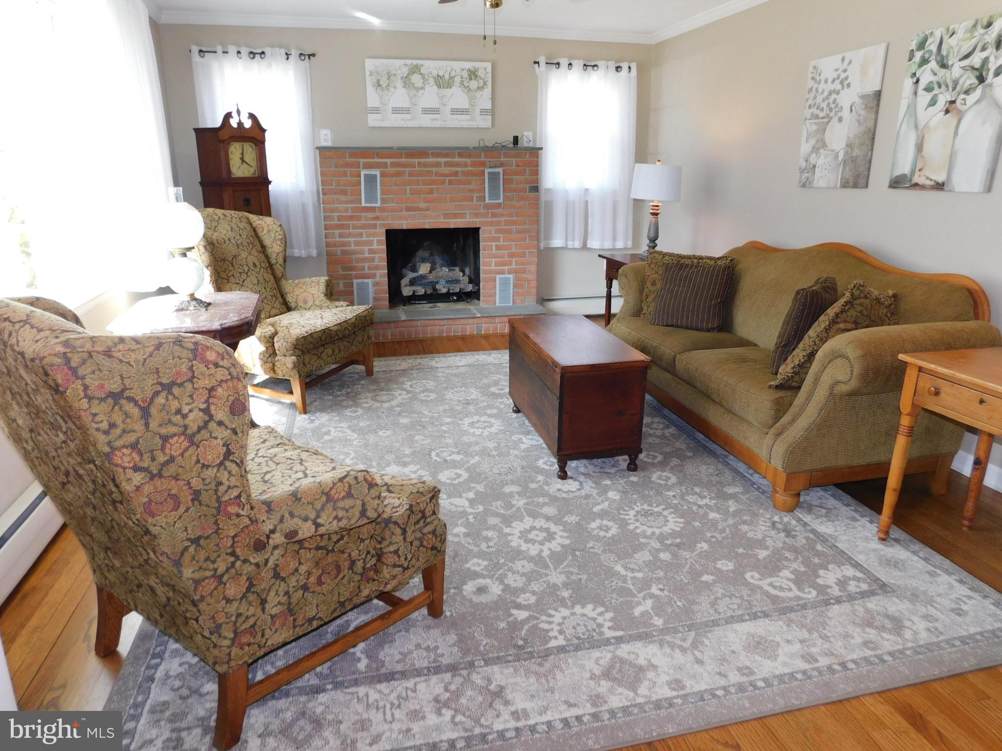 15253 Ressler Lane Blue Ridge Summit, PA 17214 - Photo 6 of 21 a living room with furniture and a fireplace