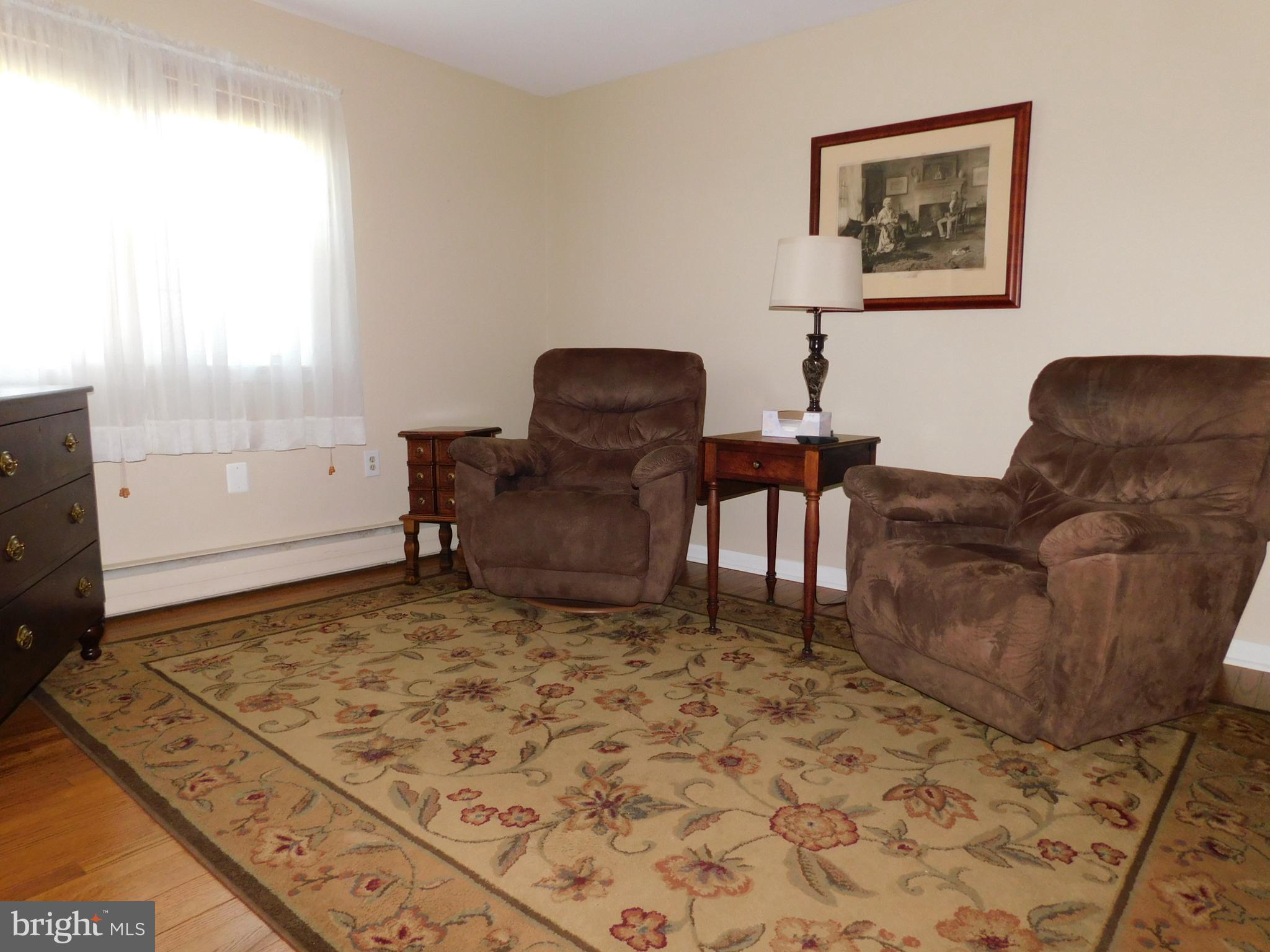 15253 Ressler Lane Blue Ridge Summit, PA 17214 - Photo 8 of 21 a living room with couches rug and a window