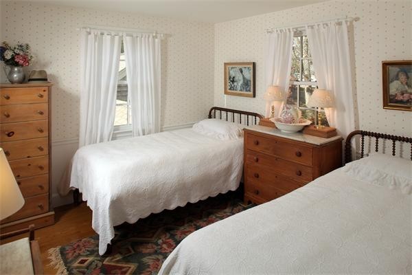 38 Standish Road Duxbury, MA 02332 - Photo 15 of 21 a bedroom with double bed and a window