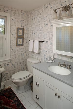 38 Standish Road Duxbury, MA 02332 - Photo 17 of 21 a bathroom with a toilet sink and mirror