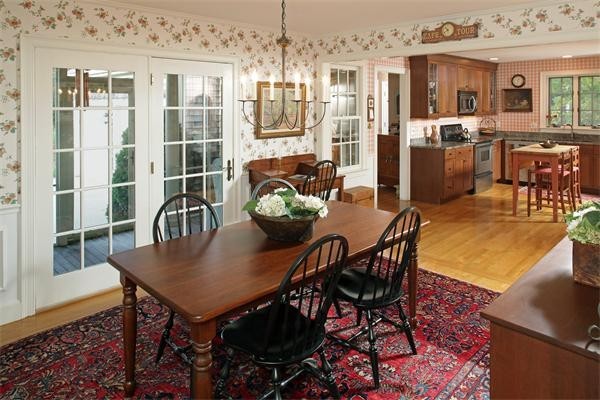 38 Standish Road Duxbury, MA 02332 - Photo 5 of 21 a view of a dining room with furniture and wooden floor