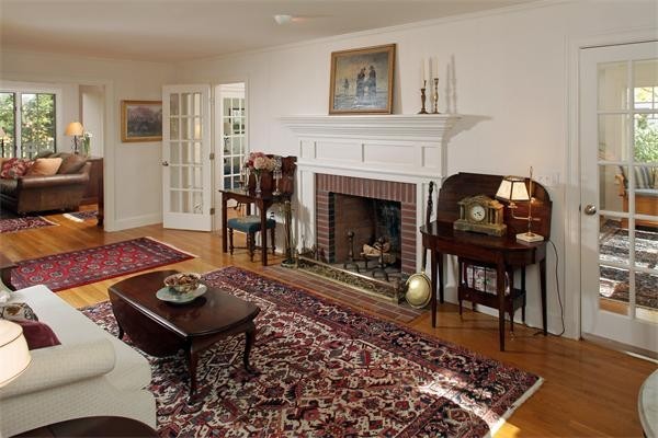 38 Standish Road Duxbury, MA 02332 - Photo 9 of 21 a living room with furniture and a fireplace