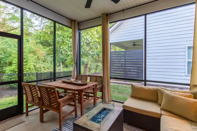 a living room with furniture and a window